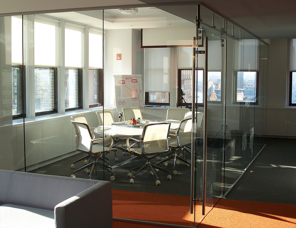 Small conference room created with office room dividers with doors